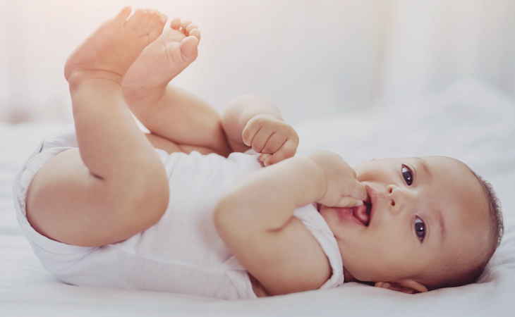 baby lying down in crib during wake window