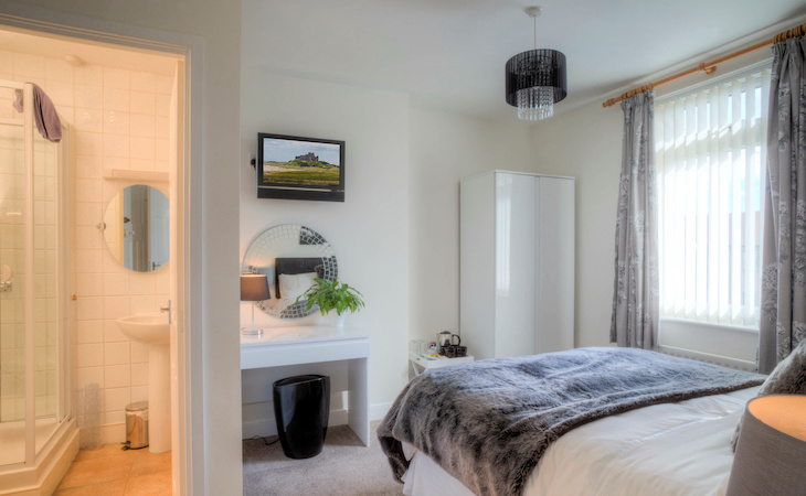 bedroom with an en suite bathroom